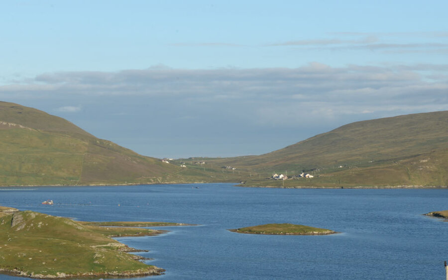 Wester Quarff, seen here from West Burra on a sunny evening.