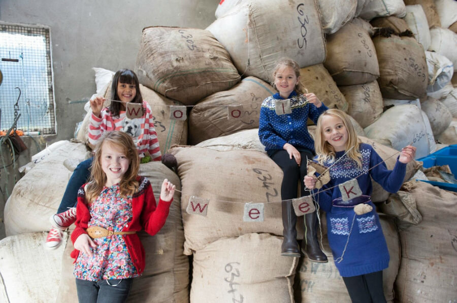 These Whalsay youngsters are clearly looking forward to getting involved in Wool Week (Courtesy Shetland Wool Week)