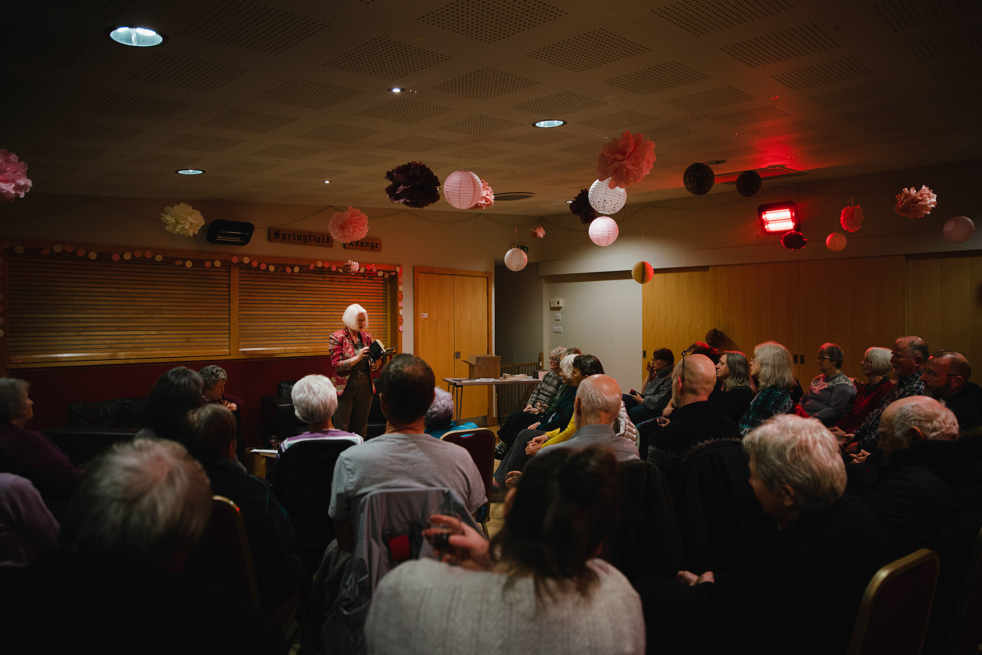 Christine de Luca speaking at a launch event for 'The Trials of Mary Johnsdaughter' in Walls Public Hall in October 2022.