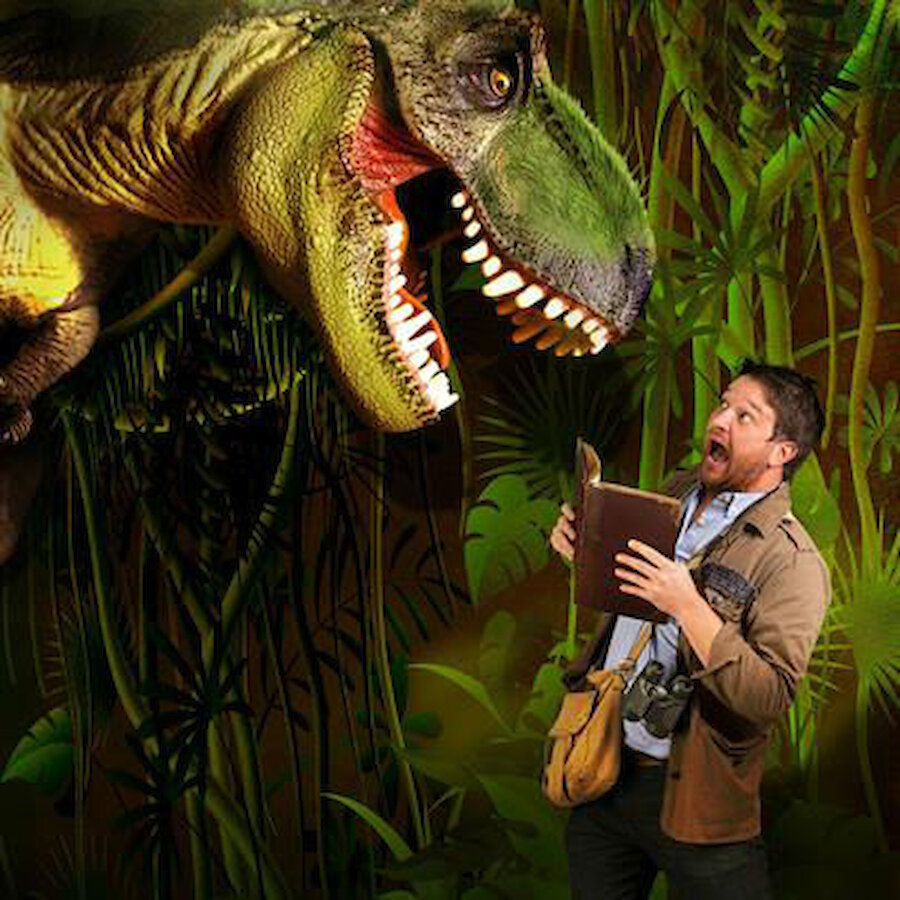 An apprehensive Dr Ben Garrod introduces us to Tyrannosaurus Rex (Courtesy Shetland Arts)