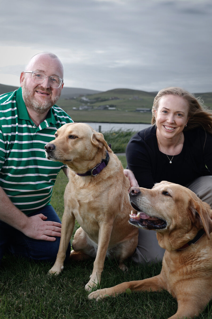 Happy writing their new chapter, Steven and Jane Wylie with their dogs.