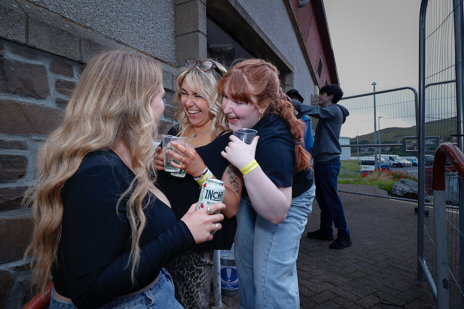 Party Goers on Friday Night | May Graham