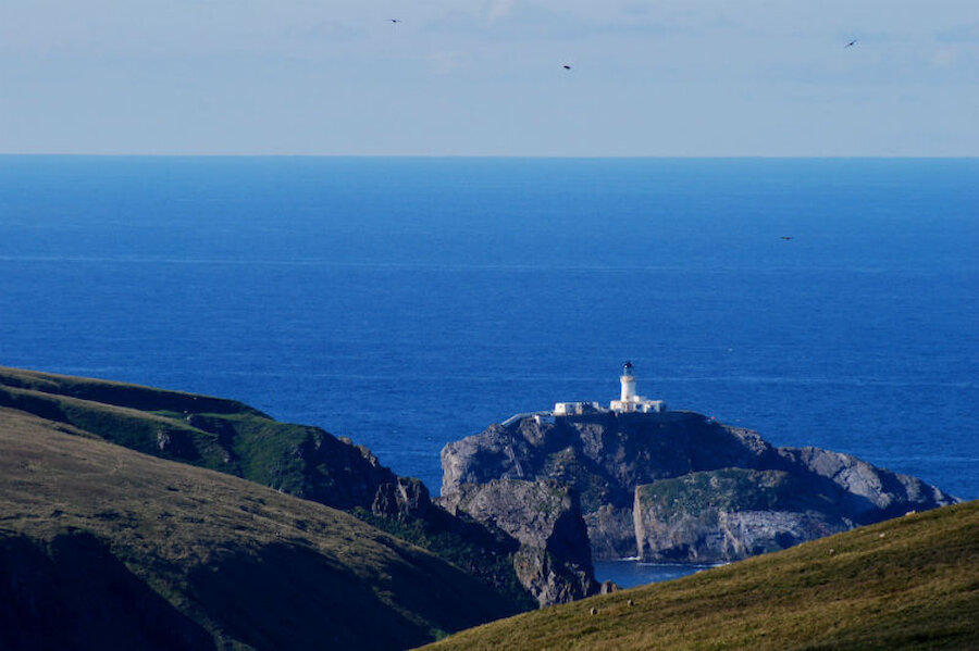Muckle Flugga lighthouse and, on the left, Hermaness, seen here from Saxa Vord (Courtesy Alastair Hamilton)