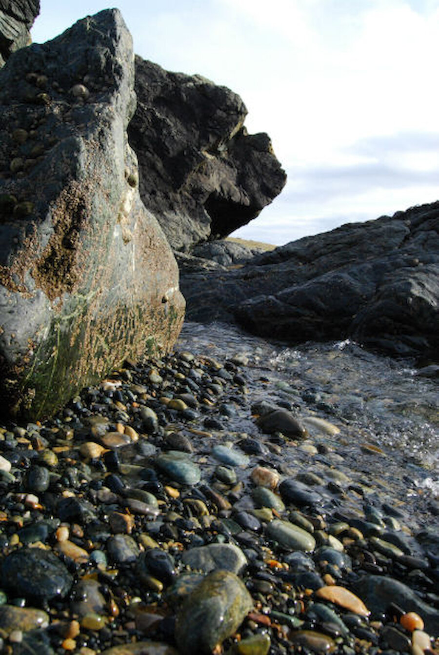 The tiny beach at Cross Geo is formed from serpentine rock (Courtesy Alastair Hamilton)
