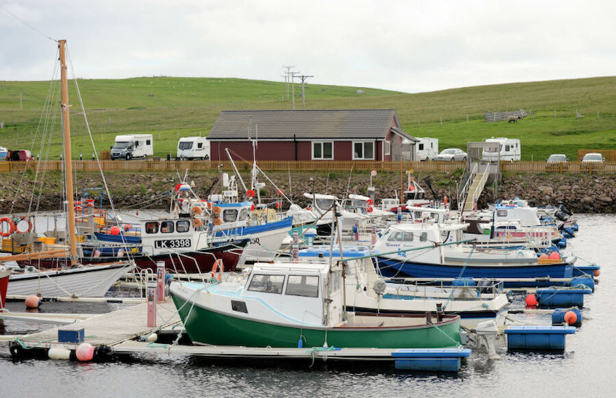 Like some other sites in Shetland, the Aithsvoe one at Cunningsburgh is adjacent to the local marina (Courtesy Alastair Hamilton)