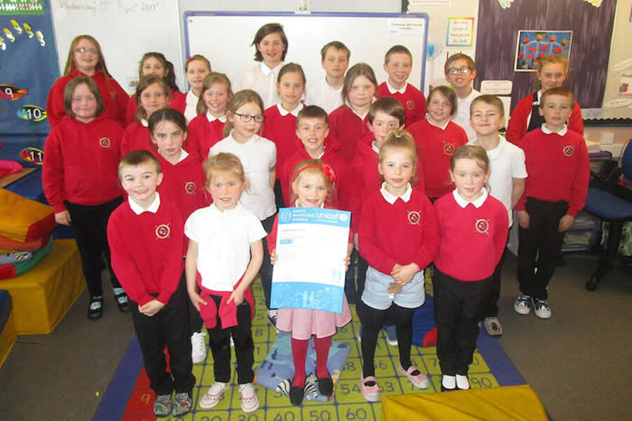 The children at Cullivoe Primary School display the award (Courtesy Shetland Islands Council)