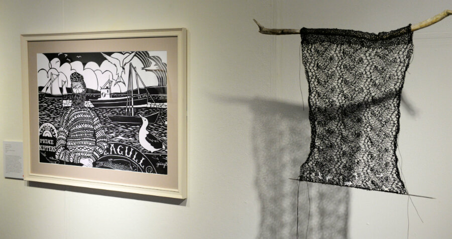 A paper-cut by Gillian Bridle (on the left) won the Craft and Design prize. On the right is Helen Robertson's 'Wake'.