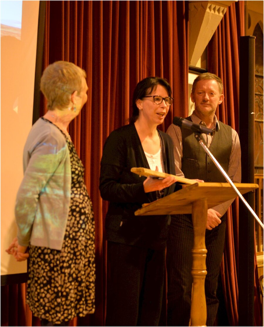 Helen Grant thanks the judges for their award of the Jimmy Perez Trophy as Douglas Henshall and Ann Cleeves look on. (photo credit Alastair Hamilton)