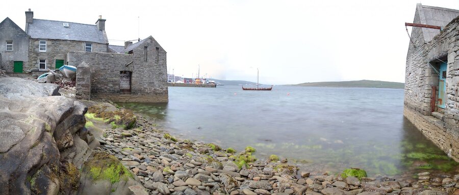 Lerwick developed along the waterfront as traders built private jetties, warehouses and dwellings known as lodberries. Some of them can be seen in this view.