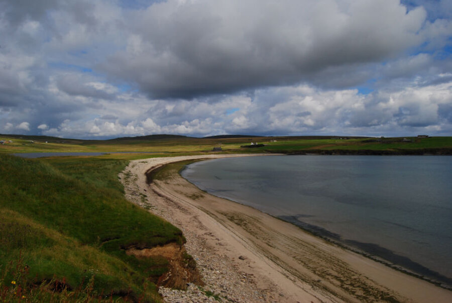The beautiful beach, backed by links and a loch, at Tresta, Fetlar.