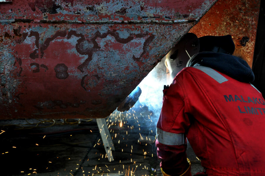 A welder at the shipyard features in One of Susan Timmins' photographs (Courtesy Susan Timmins/Shetland Arts)