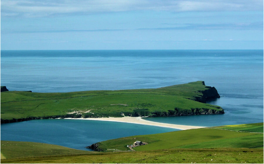 St Ninian's Isle is connected to the mainland by a magnificent sand and shingle tombolo, the night-time setting for the galley burning in the 2015 South Mainland Up Helly Aa.