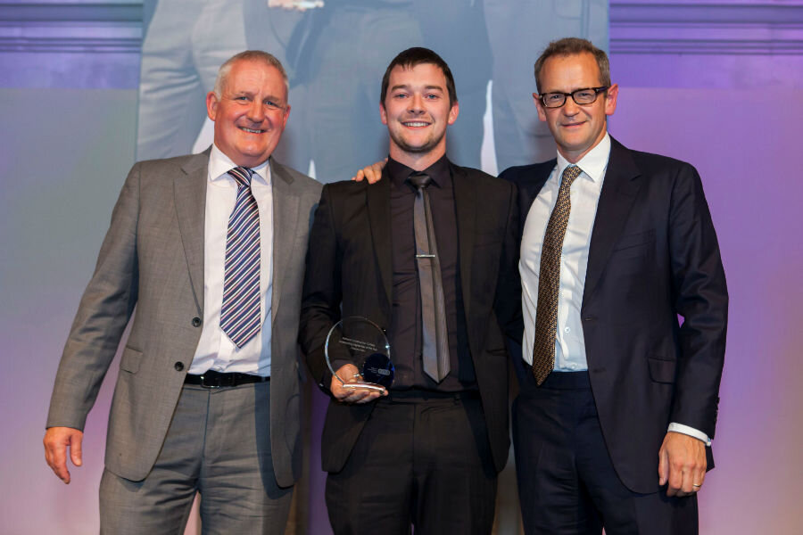 Christopher Smith is congratulated after receiving his award (Courtesy CITB)