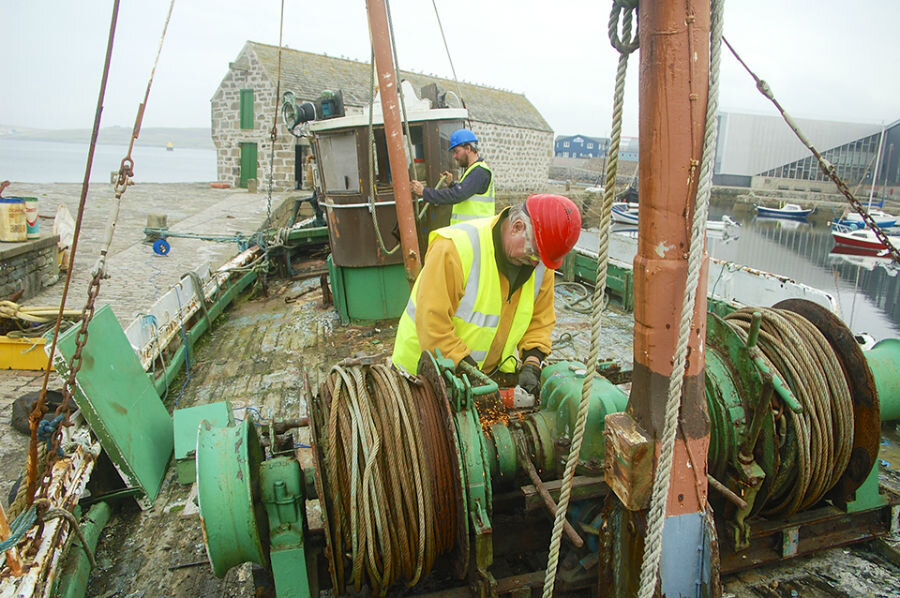 Peter Chroston and Tim Senften begin work on the restoration (Courtesy Shetland Amenity Trust)