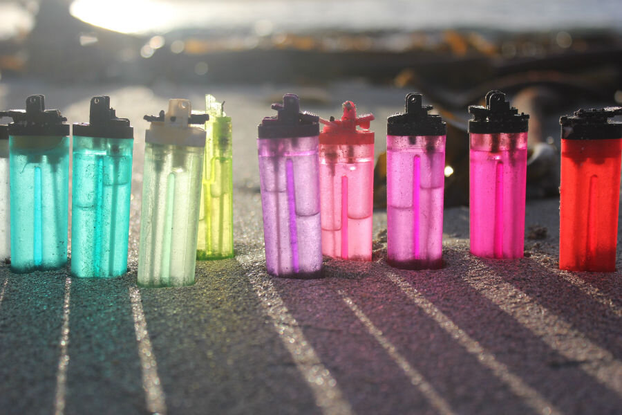 Samantha Dennis – Biodoodle, Lighters gathered on the beach.