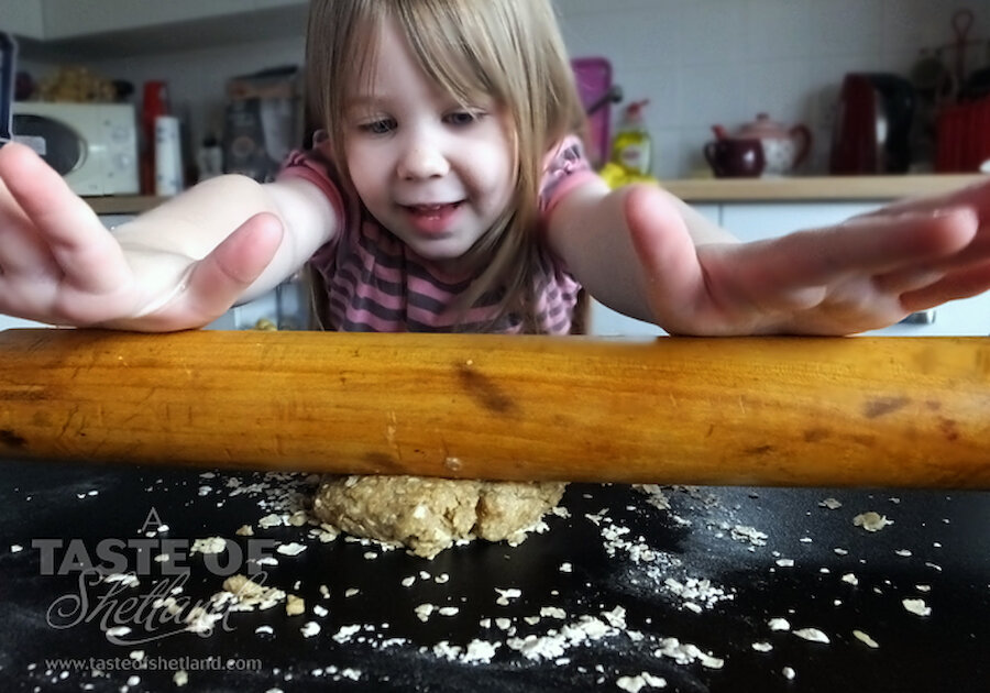 Doris Inkster's great-granddaughter Carah (age 3), rolling out the oatcake dough