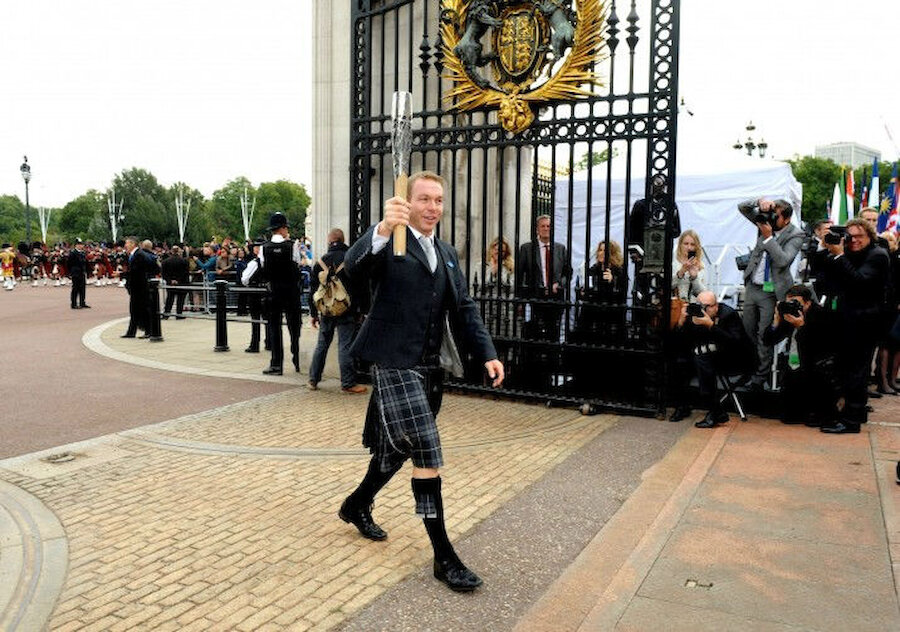The first baton-bearer was cyclist Sir Chris Hoy, seen here at Buckingham Palace. (Courtesy Glasgow 2014)