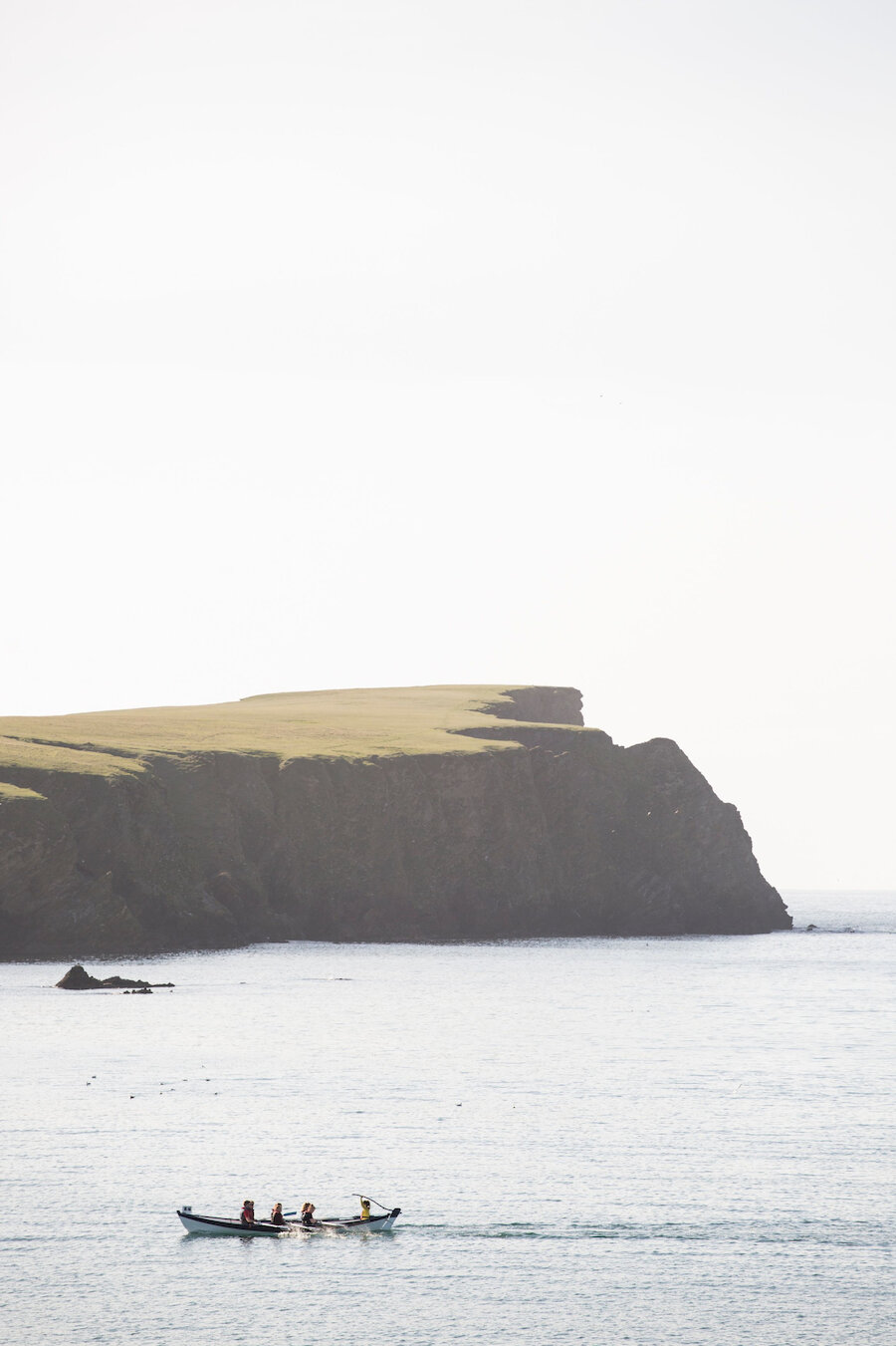 Yoal rowing in front of St Ninian's Isle | River Thompson
