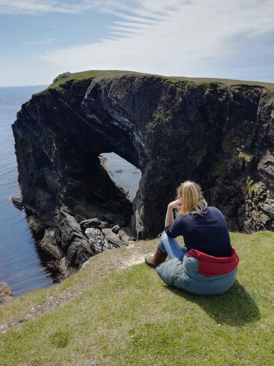Taking a break from surveying to admire the stunning Fetlar coastline.