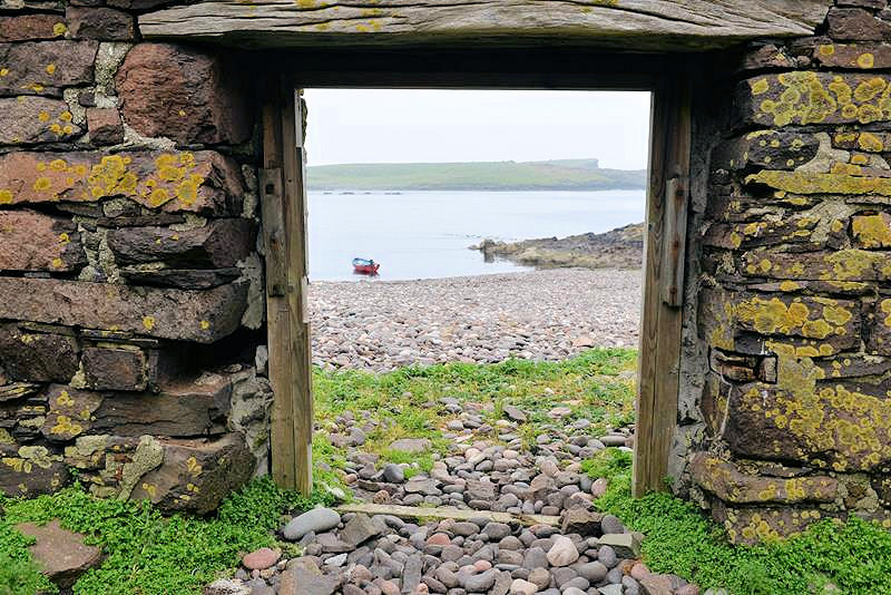 A view of the beach and bay from the surviving booth. | Alastair Hamilton