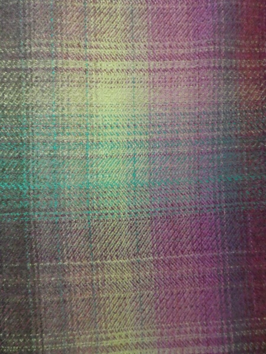 A detail emphasises the way in which this Shetland Tweed Company fabric draws on Shetland landscape colours. | Alastair Hamilton