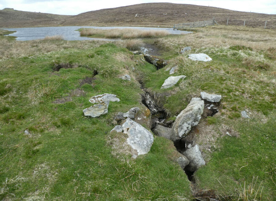 The site of a former sluice gate in the mill dam at Loch of Gershon, East Burra Isle (Courtesy Alastair Hamilton)