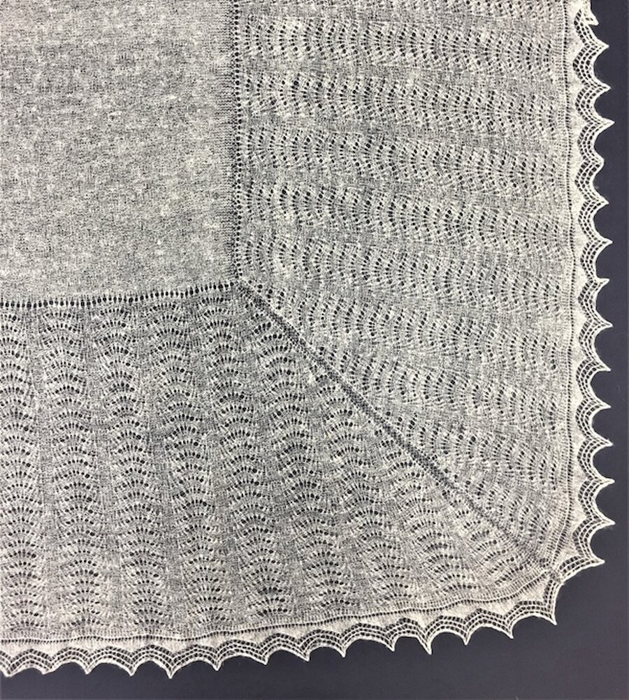 A crepe shawl showing its lace border. | Shetland Museum and Archives