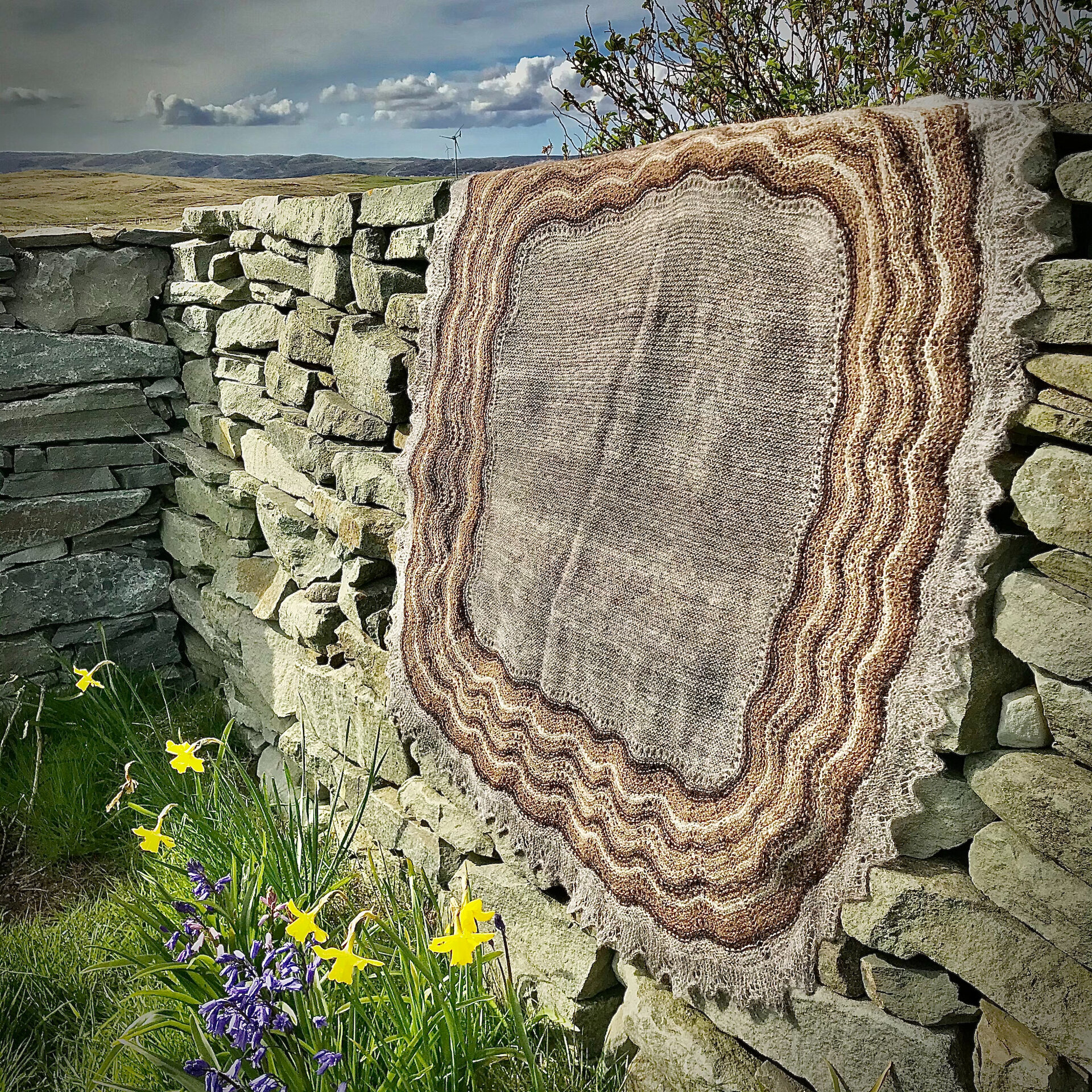 An exquisite Shetland hap shawl made from Garths Croft Bressay fleeces by Mary Boyd.