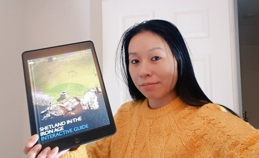 Dr Li Sou with the new interactive iBook 'Shetland in the Iron Age'.