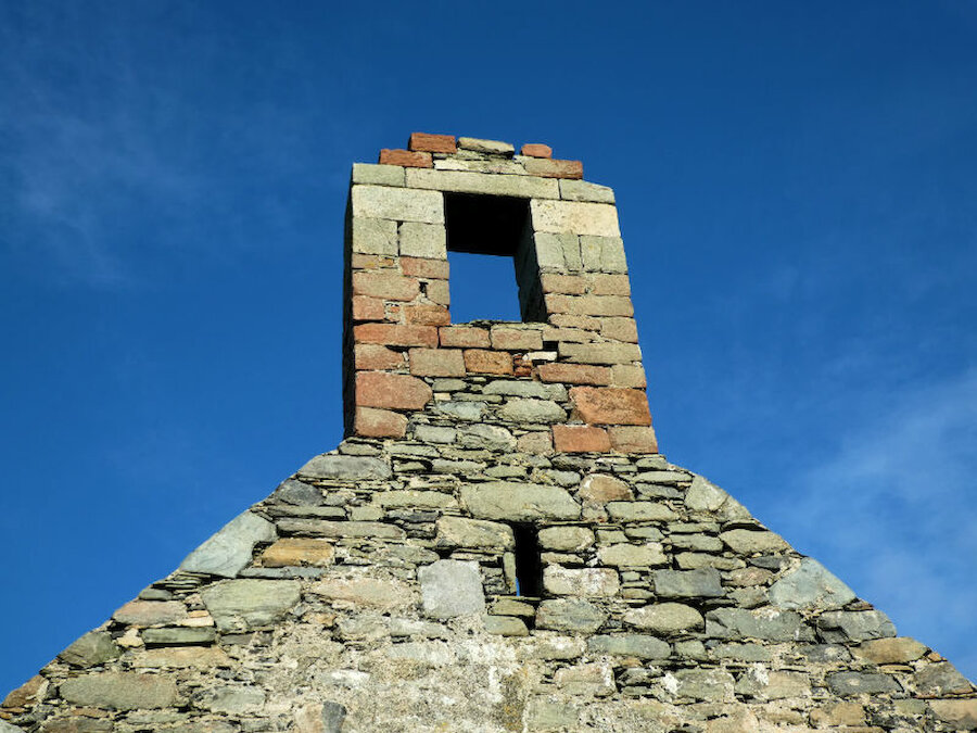 The bell tower at Papil, with some of the red Orkney sandstone incorporated into the structure (Courtesy Alastair Hamilton)