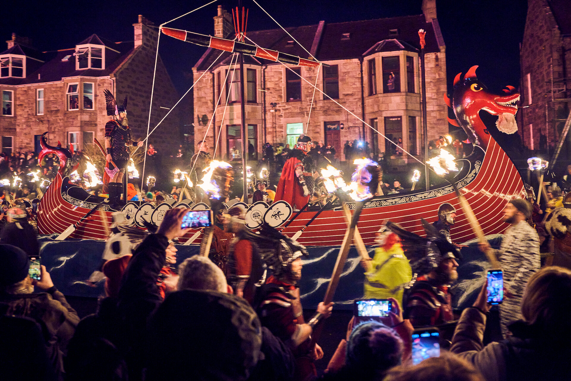 The spectacular torchlit procession around Lerwick drew hundreds of spectators onto the streets - and tens of thousands more watched online. Photo: Euan Myles/Promote Shetland.