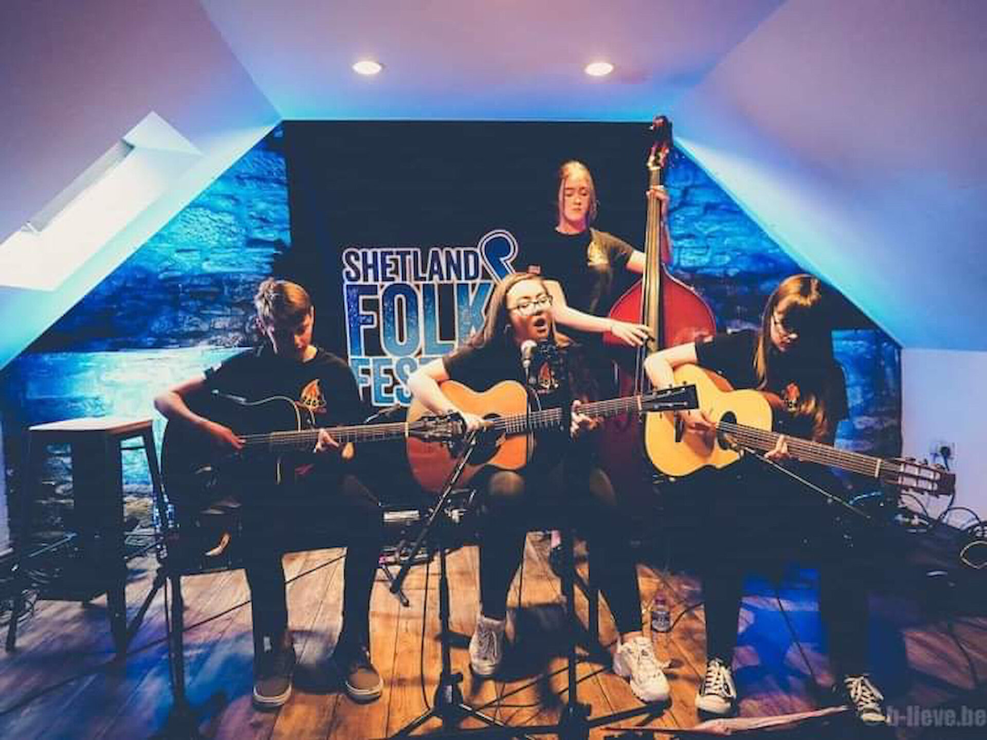 In their younger days... High Level Hot Club performing an intimate set as part of the 2019 Shetland Folk Festival.