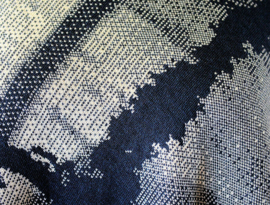 A detail of a Rani piece, showing pattern derived from Fair Isle, overlaid with a much-enlarged sample of Shetland lace (Courtesy Alastair Hamilton)
