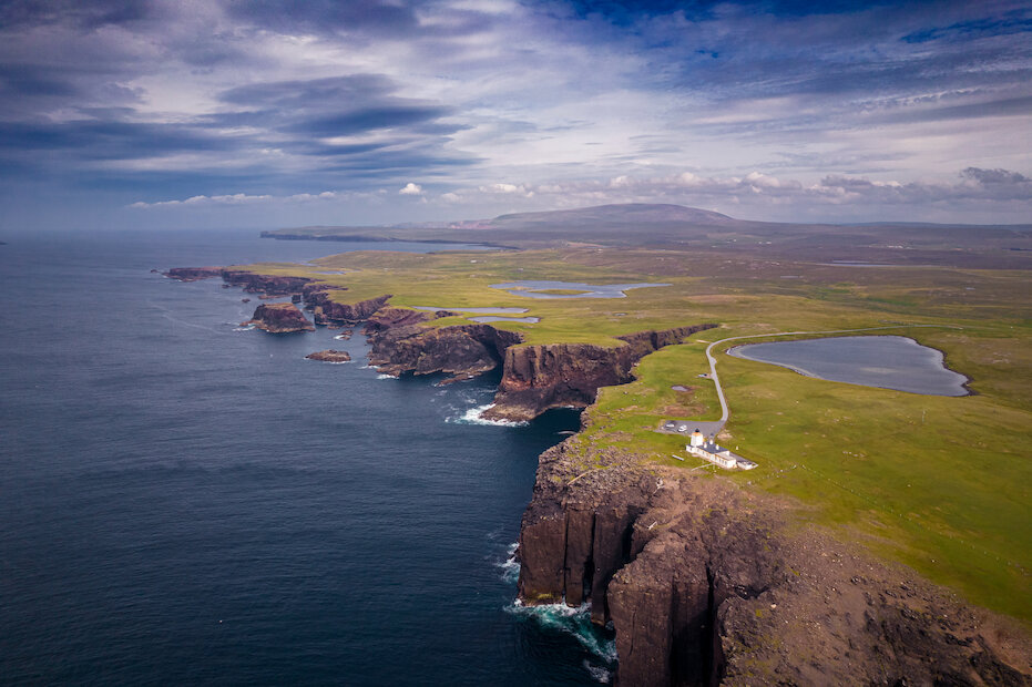 Shetland's North Mainland cliffs, with the Eshaness Lighthouse in the foreground. | Euan Myles