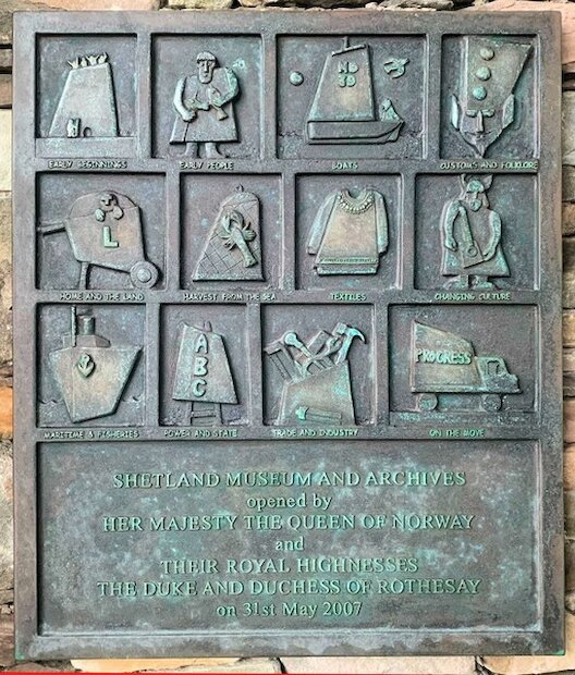 The bronze plaque by Mike McDonnell at the entrance to the Shetland Museum and Archives | Alastair Hamilton