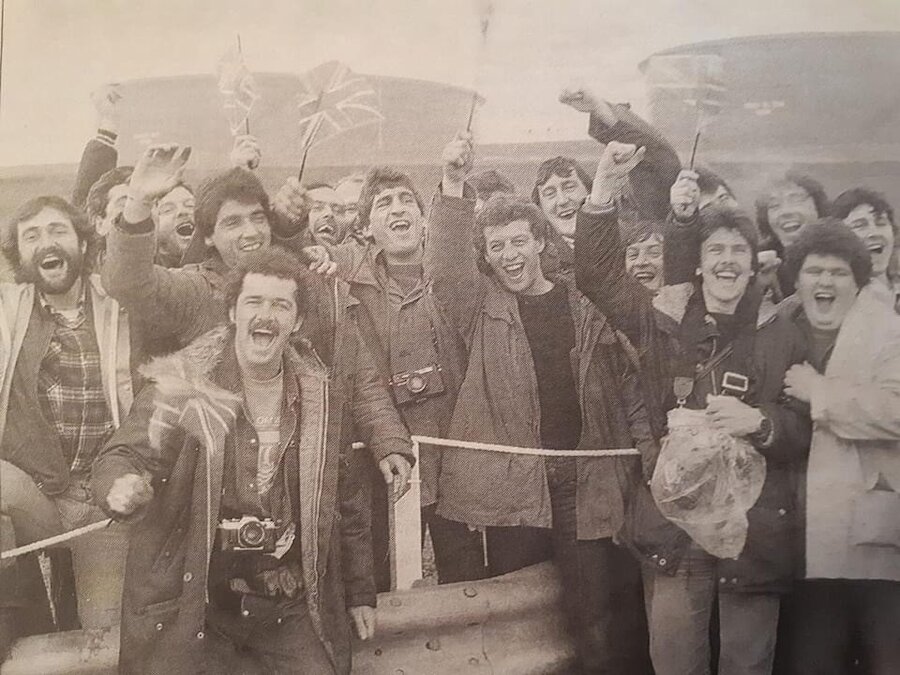 Workers cheer during the opening ceremony. | Submitted by David Manson