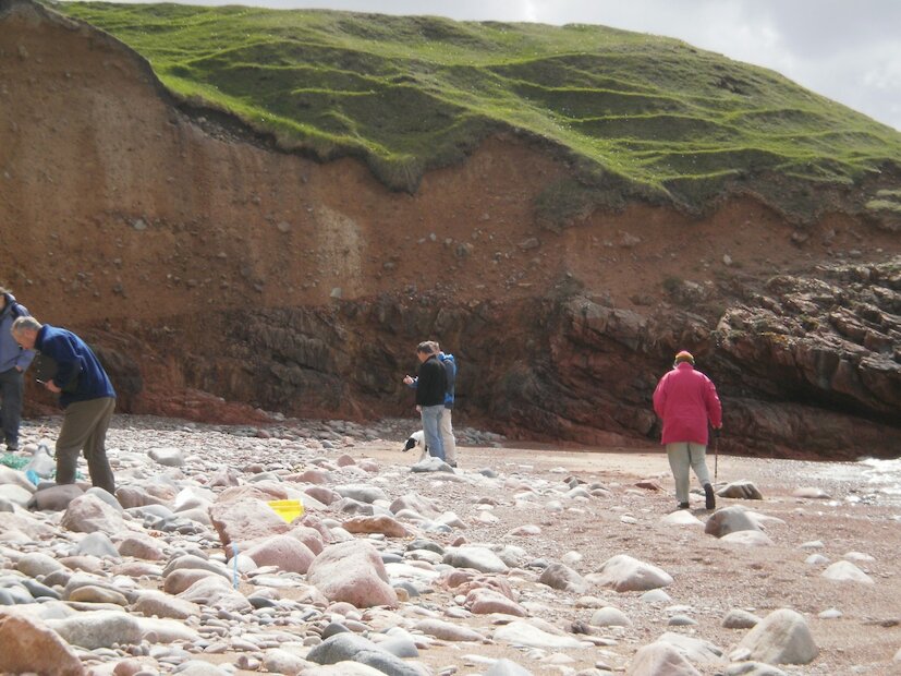 Granite beneath glacial till at the east end of Braewick Beach