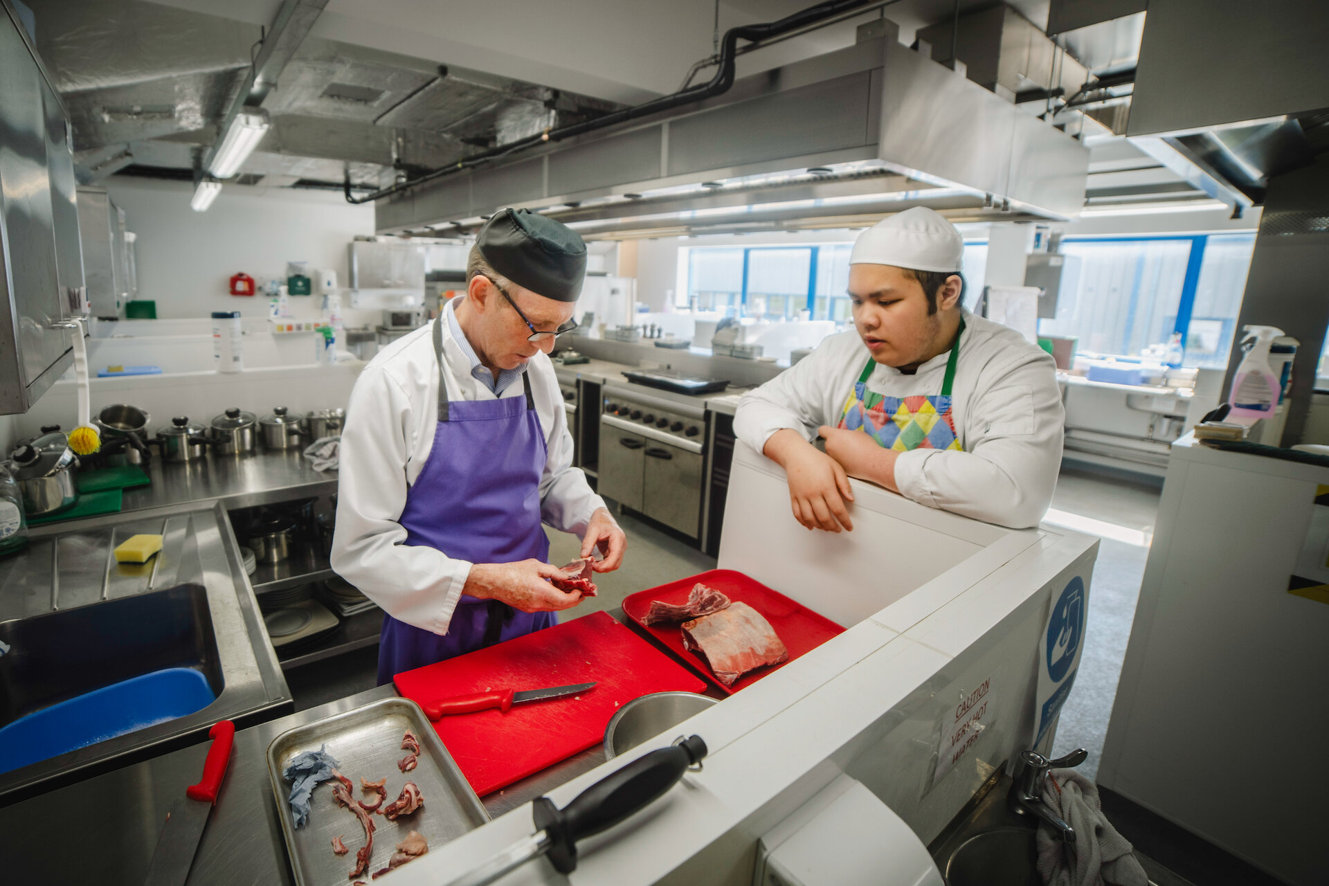Experienced tutors offer expert advice to catering and hospitality students in professional standard kitchens.