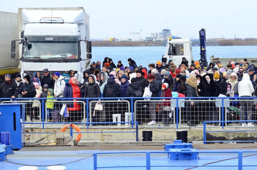 Refugees from Ukraine wit to disembark from a ferry arriving in Romania. | Jen Stout