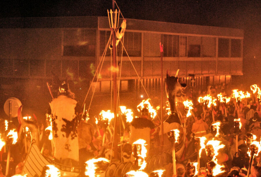 The Up Helly Aa galley passes the former Shetland Museum (Courtesy Alastair Hamilton)