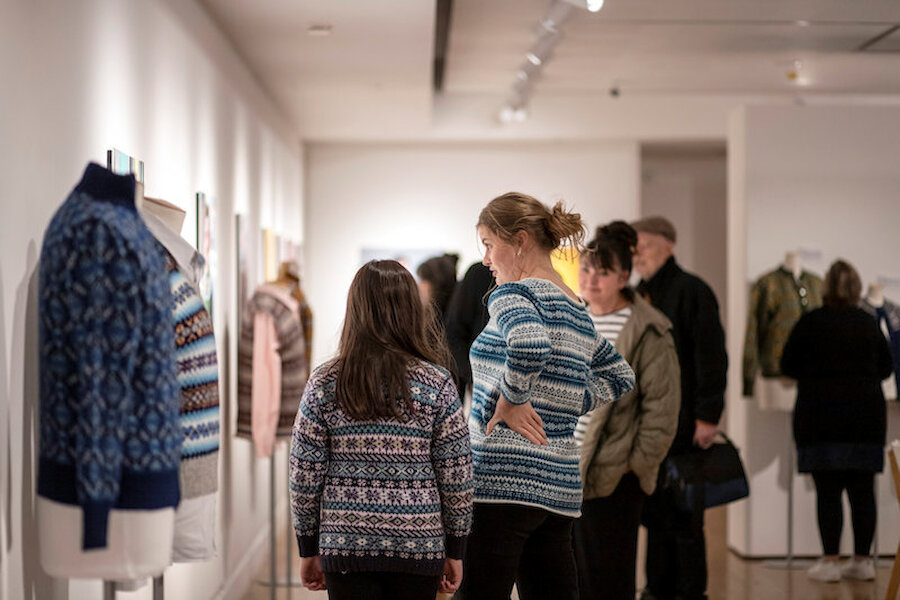 Visitors enjoy the exhibition on the opening night. | Alexa Fitzgibbon