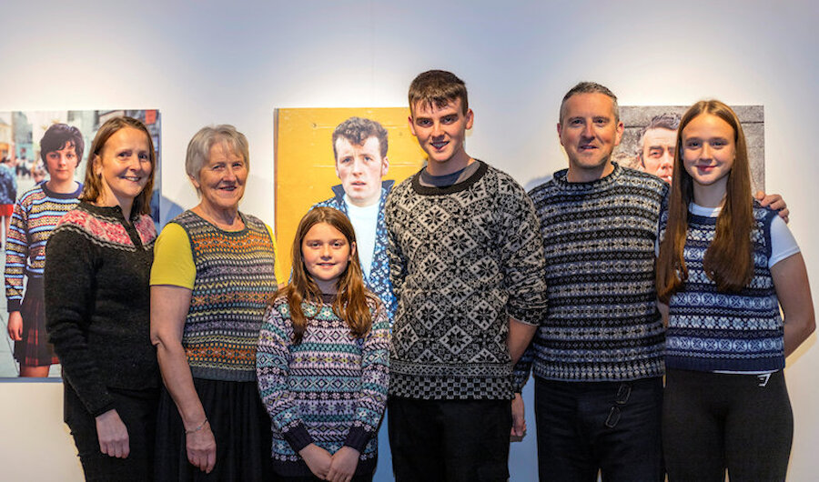 Three generations of the Scollay family with the photograph of John Scollay. | Alexa Fitzgibbon