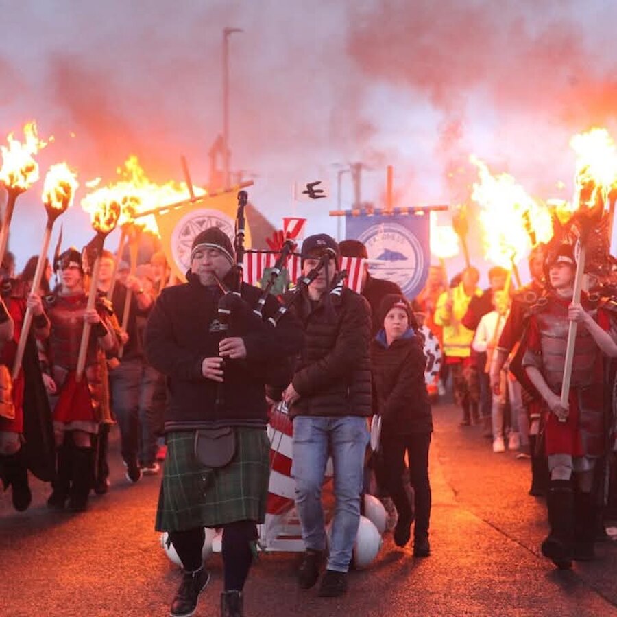 Brian Chittick plays a role as piper in one of Shetland's winter fire festivals.