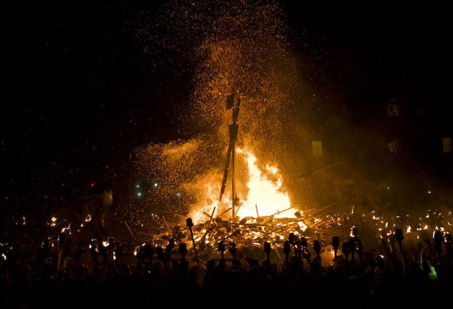 Torches are thrown into the Lerwick galley (Courtesy Alastair Hamilton)