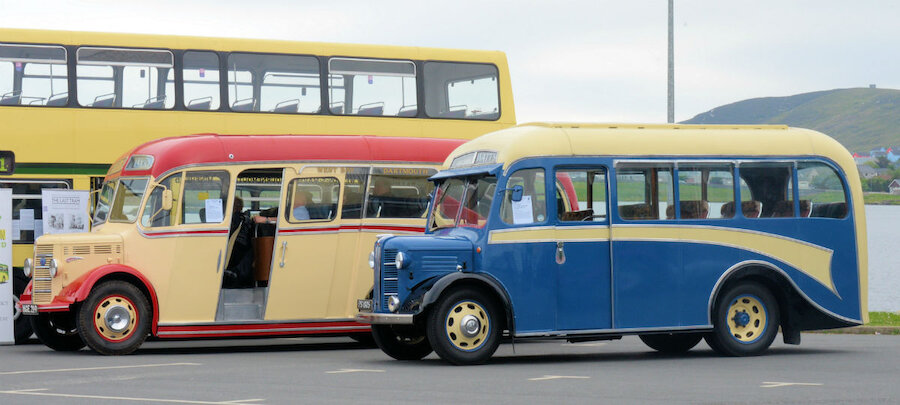 Two buses that saw service in Shetland. The Bedford on the left returned last year from a lengthy spell in England (Courtesy Alastair Hamilton)