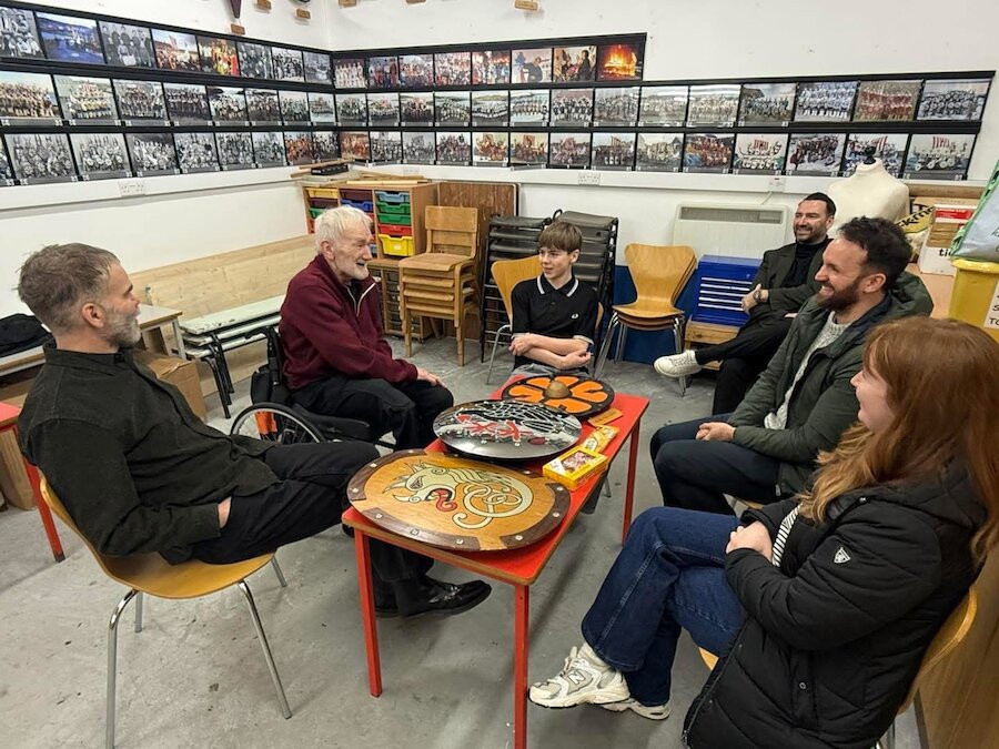 Preparing for the big day - three generations of Junior Jarls gather in the Peerie Galley Shed.