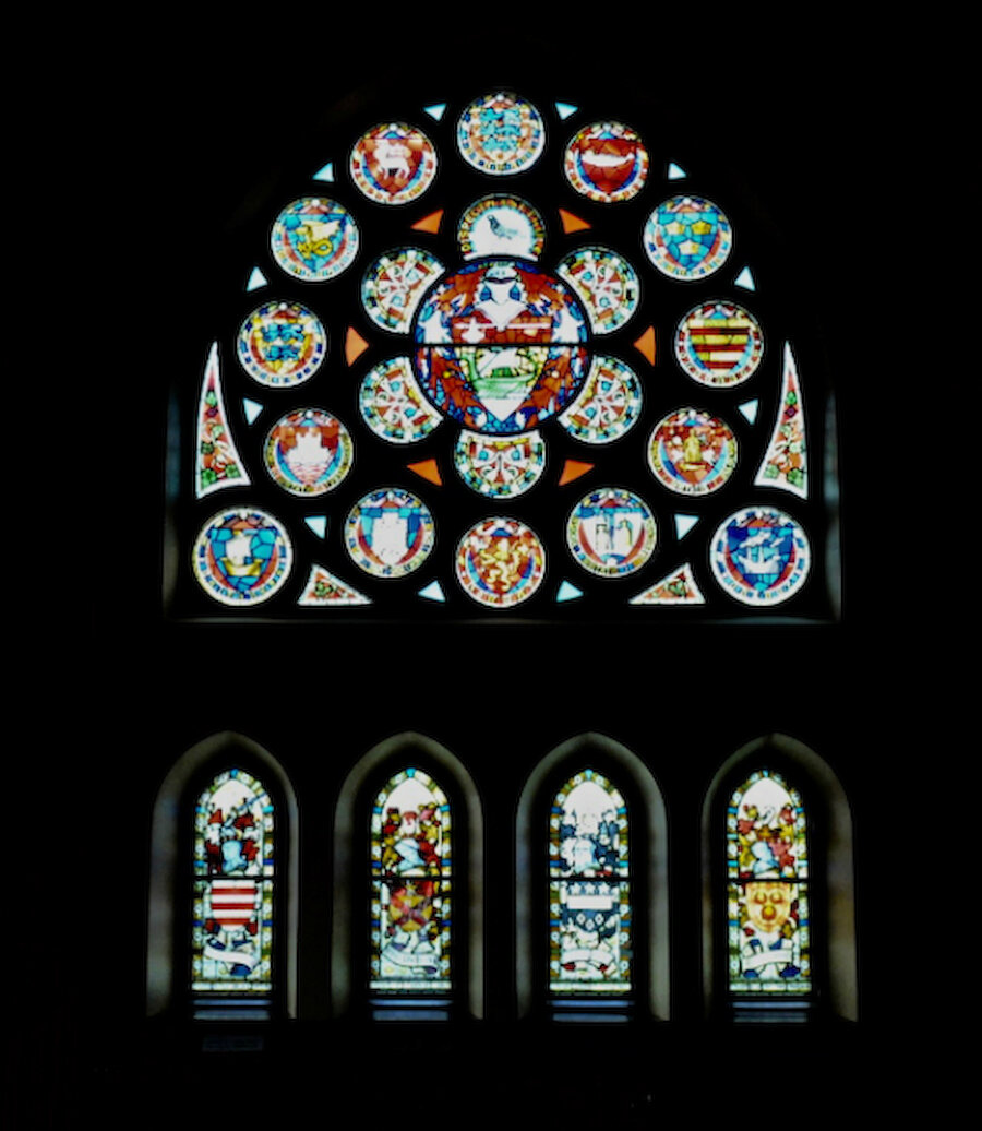 The rose window and its four companions in the north wall of the main hall (Courtesy Alastair Hamilton)