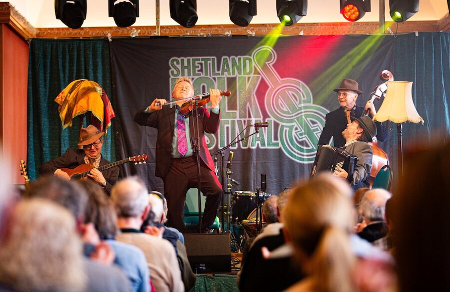 What should visitors expect at the Shetland Folk Festival?