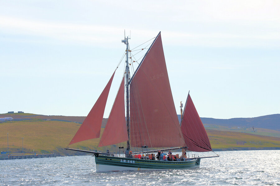 The 'Swan', seen here sailing out of the northern entrance to Lerwick Harbour (Courtesy Alastair Hamilton)