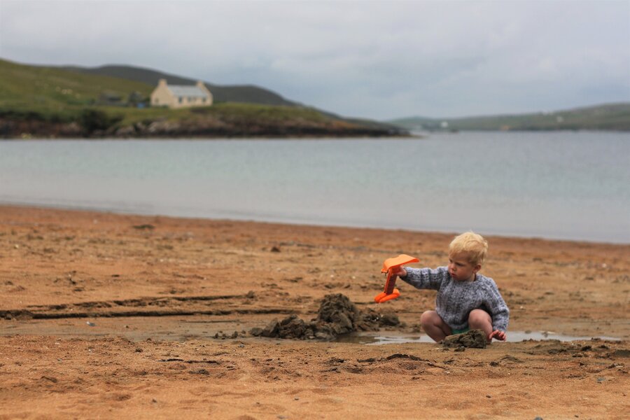 Playing at Reawick beach, Shetland.